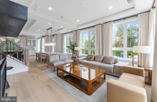 1632 Chain Bridge Rd, Mclean, VA 22101 - living room featuring a tray ceiling, light wood-style floors, stairway, crown molding, and recessed lighting