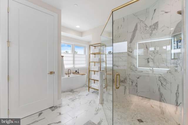 1632 Chain Bridge Rd, Mclean, VA 22101 - full bathroom with marble finish flooring, a soaking tub, a marble finish shower, and recessed lighting