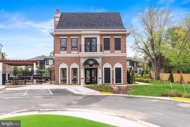 1632 Chain Bridge Rd, Mclean, VA 22101 - view of building exterior with uncovered parking