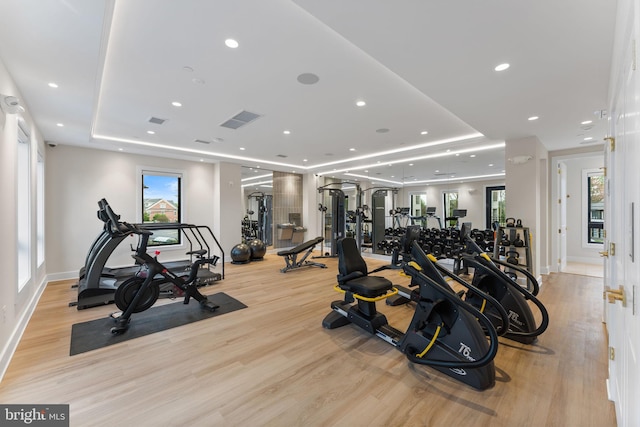 1632 Chain Bridge Rd, Mclean, VA 22101 - workout area featuring a raised ceiling, light wood finished floors, recessed lighting, and baseboards