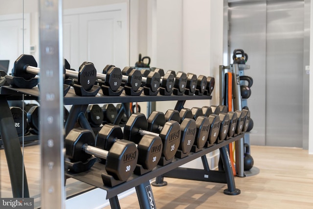 1632 Chain Bridge Rd, Mclean, VA 22101 - workout area with wood finished floors and elevator
