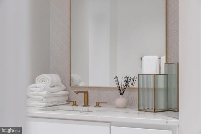 1632 Chain Bridge Rd, Mclean, VA 22101 - bathroom view of decorative backsplash and vanity