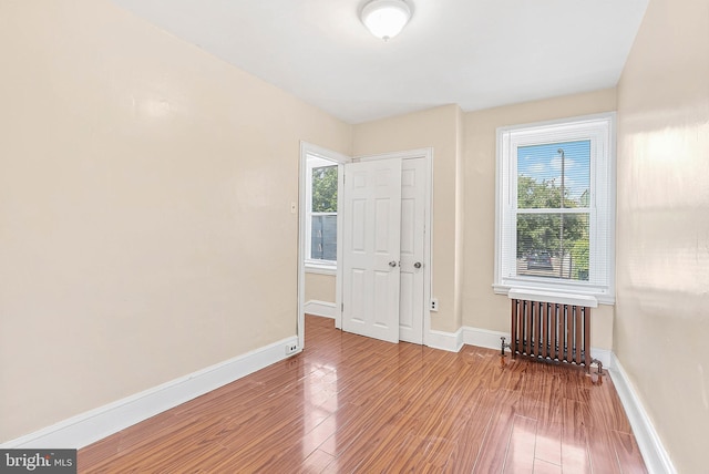 159 W Palmer St, Philadelphia, PA 19122 - spare room featuring radiator heating unit, wood finished floors, and baseboards