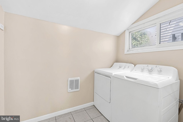 159 W Palmer St, Philadelphia, PA 19122 - laundry area featuring separate washer and dryer, light tile patterned floors, and baseboards