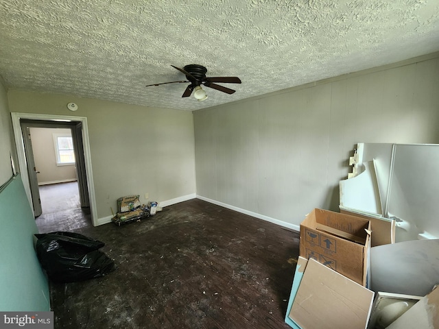 1609 Spruce St, Baltimore City, MD 21226 - spare room with ceiling fan, a textured ceiling, baseboards, and wood finished floors