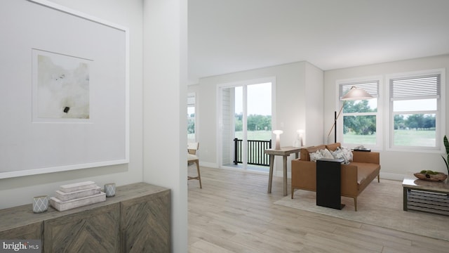 23640 Bolton Crescent Ter Unit 13-306, Ashburn, VA 20148 - living room featuring light wood-style floors and baseboards