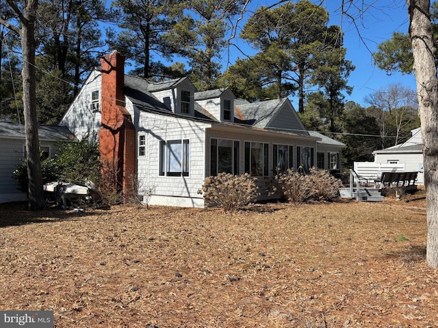 924 Blackbeard Pond Rd, Hague, VA 22469 - back of property with a chimney and a sunroom