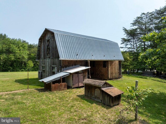 10496 Red Hawk Ln, Huntingdon, PA 16652 - back of house with a gambrel roof, metal roof, a lawn, and an outdoor structure