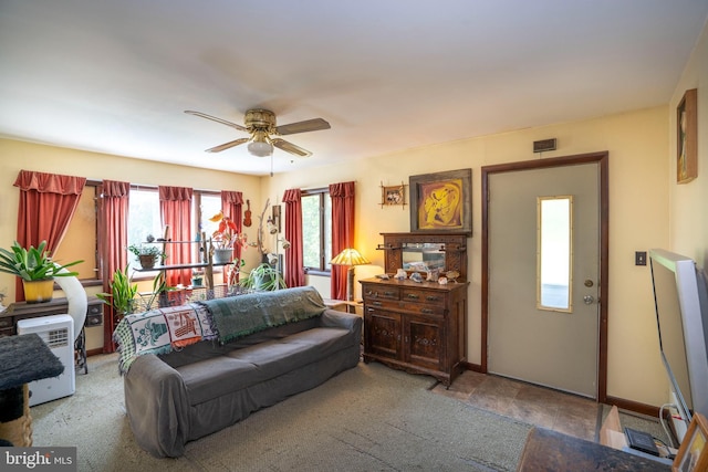 10496 Red Hawk Ln, Huntingdon, PA 16652 - living area featuring a ceiling fan and baseboards