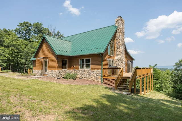 2020 Quaint Acres Ln, Berkeley Springs, WV 25411 - back of property with a deck, stone siding, a chimney, and a standing seam roof