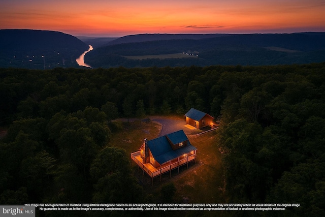 2020 Quaint Acres Ln, Berkeley Springs, WV 25411 - view from above of property with a heavily wooded area and a mountain backdrop