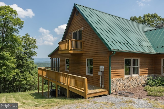 2020 Quaint Acres Ln, Berkeley Springs, WV 25411 - view of side of home with a standing seam roof, a balcony, metal roof, and a wooden deck