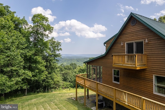 2020 Quaint Acres Ln, Berkeley Springs, WV 25411 - view of property exterior with cooling unit, a lawn, and a deck with mountain view