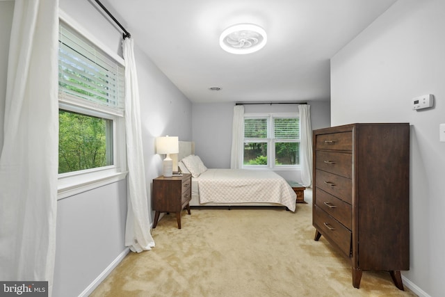 8170 Sinclair Mill Rd, Manassas, VA 20112 - bedroom featuring light carpet and baseboards