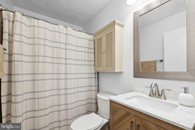 8170 Sinclair Mill Rd, Manassas, VA 20112 - full bath featuring toilet, vanity, a textured ceiling, and a shower with shower curtain