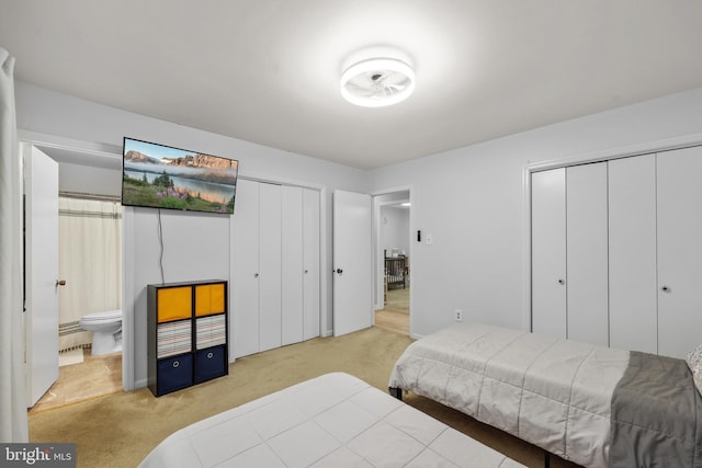 8170 Sinclair Mill Rd, Manassas, VA 20112 - bedroom with multiple closets, carpet, and ensuite bath