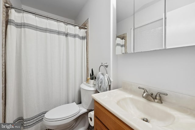 8170 Sinclair Mill Rd, Manassas, VA 20112 - bathroom featuring toilet, vanity, and a shower with shower curtain