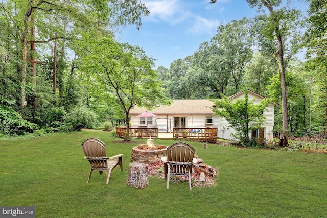 8170 Sinclair Mill Rd, Manassas, VA 20112 - view of green lawn featuring an outdoor fire pit and a wooden deck