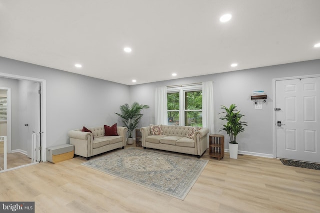 8170 Sinclair Mill Rd, Manassas, VA 20112 - living room with wood finished floors, recessed lighting, and baseboards