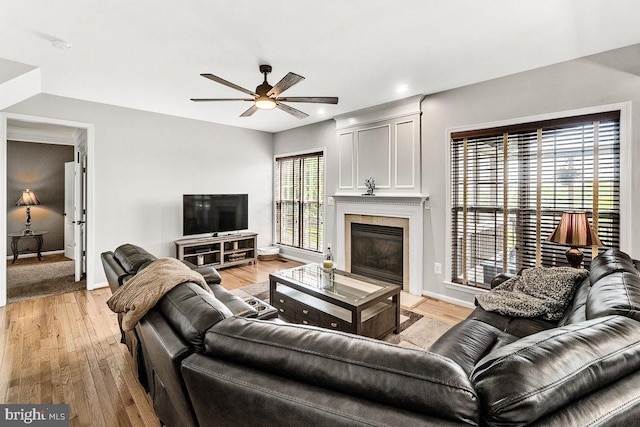 202 Galyn Dr, Brunswick, MD 21758 - living room featuring a ceiling fan, baseboards, light wood-style floors, a high end fireplace, and recessed lighting