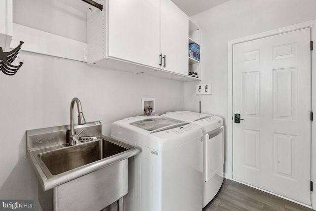 202 Galyn Dr, Brunswick, MD 21758 - laundry room with cabinet space, washer and dryer, and dark wood-type flooring