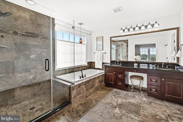 202 Galyn Dr, Brunswick, MD 21758 - full bath with a garden tub, a shower stall, double vanity, and stone finish floors