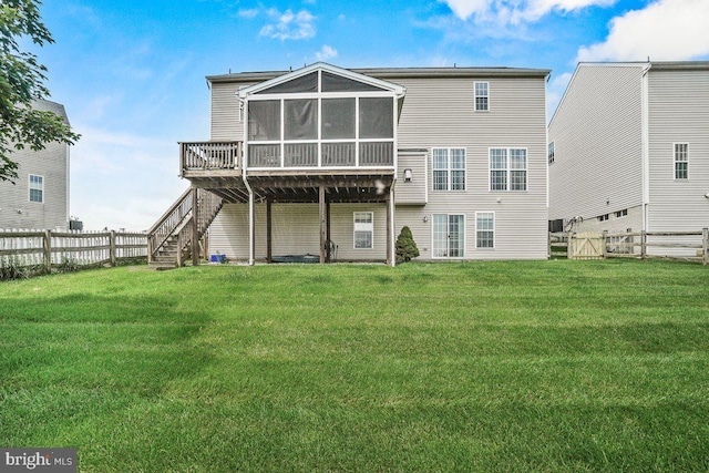 202 Galyn Dr, Brunswick, MD 21758 - back of property with stairway, a sunroom, and a deck