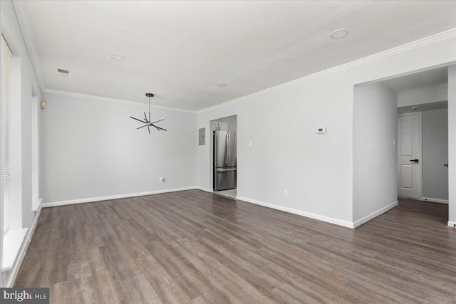 1701 Gainesville St SE Unit 101, Washington, DC 20020 - spare room featuring a chandelier, dark wood-style floors, baseboards, and ornamental molding