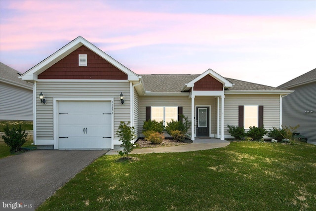 17324 Mary Adams Ave, Bowling Green, VA 22427 - ranch-style house featuring a garage, a lawn, and driveway