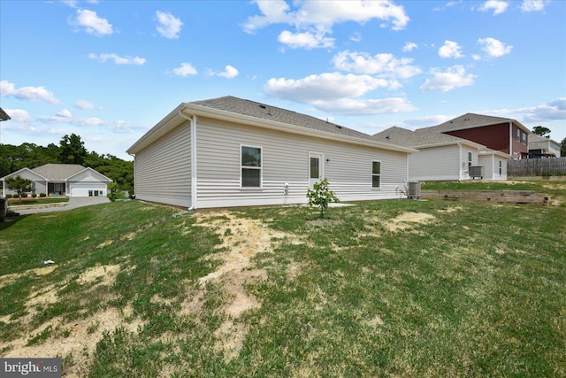 17324 Mary Adams Ave, Bowling Green, VA 22427 - back of property featuring a yard and central AC