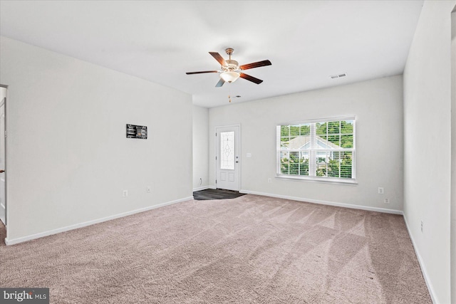 17324 Mary Adams Ave, Bowling Green, VA 22427 - empty room featuring carpet floors, a ceiling fan, and baseboards