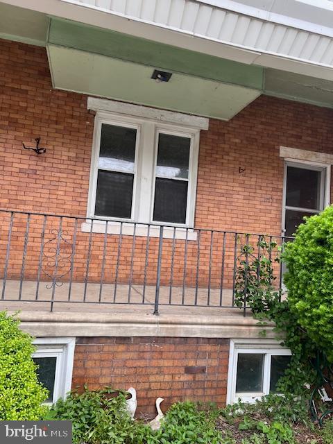 171 W Clarkson Ave, Philadelphia, PA 19120 - view of property exterior with brick siding