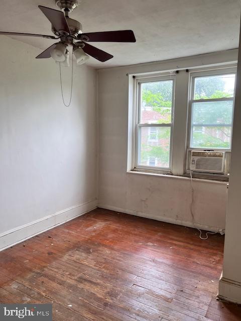 171 W Clarkson Ave, Philadelphia, PA 19120 - unfurnished room with hardwood / wood-style flooring, healthy amount of natural light, and cooling unit