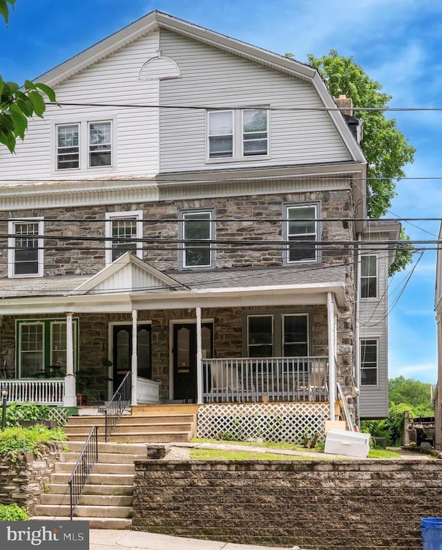 134 W Mount Pleasant Ave, Philadelphia, PA 19119 - view of front of property featuring stone siding and a porch