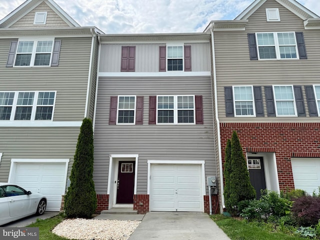 138 Drexel Ct, Martinsburg, WV 25404 - multi unit property with an attached garage, driveway, and brick siding