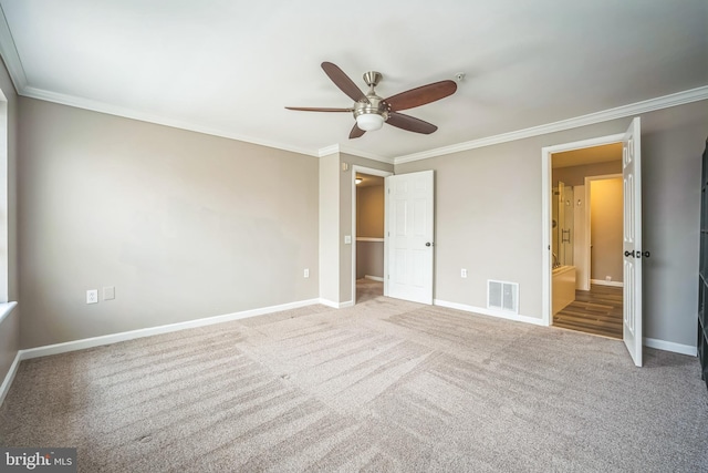 305 S Payne St Unit 305, Alexandria, VA 22314 - unfurnished bedroom with crown molding, carpet floors, connected bathroom, and ceiling fan