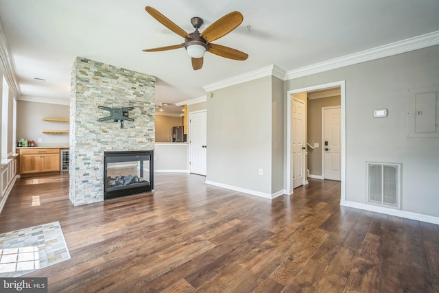 305 S Payne St Unit 305, Alexandria, VA 22314 - unfurnished living room featuring ceiling fan, crown molding, electric panel, dark wood-type flooring, and beverage cooler