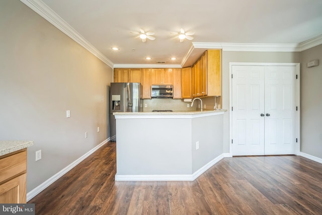 305 S Payne St Unit 305, Alexandria, VA 22314 - kitchen featuring stainless steel appliances, ornamental molding, dark wood-type flooring, recessed lighting, and backsplash