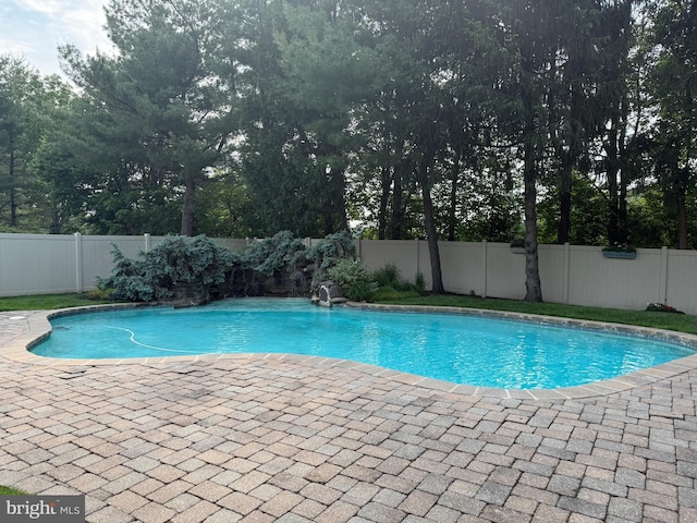 4170 Tersher Dr, Doylestown, PA 18902 - view of swimming pool featuring a fenced backyard, a patio area, and view of scattered trees