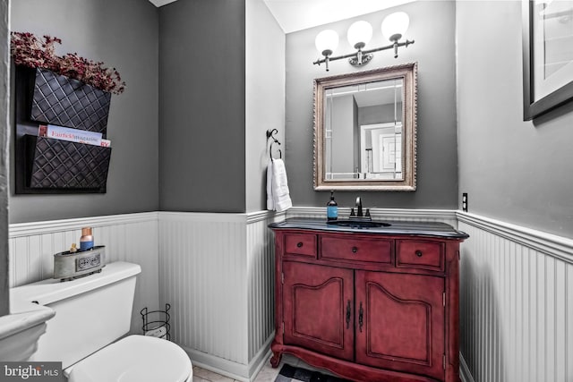 4170 Tersher Dr, Doylestown, PA 18902 - half bath featuring toilet, wainscoting, and vanity