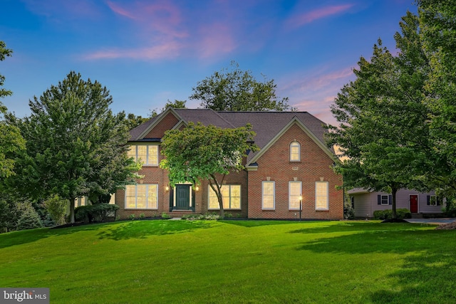 17301 Roundmont Pl, Round Hill, VA 20141 - view of front facade with a lawn and brick siding