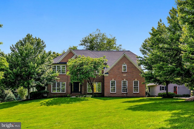 17301 Roundmont Pl, Round Hill, VA 20141 - view of front of house featuring a front lawn and brick siding