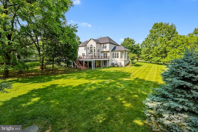 17301 Roundmont Pl, Round Hill, VA 20141 - back of house with stairway, a deck, and a lawn