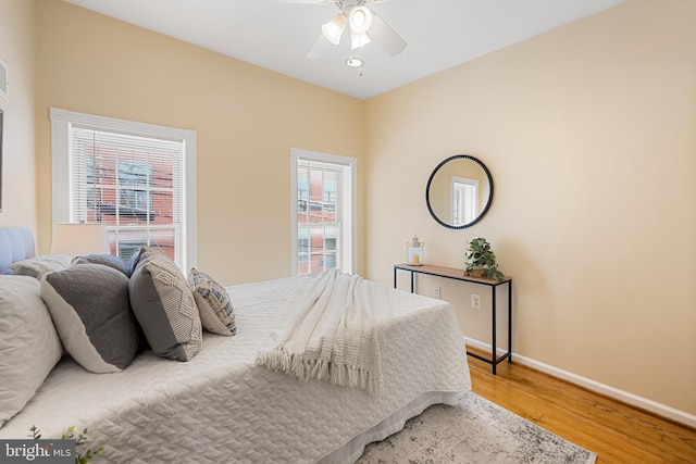 234 E Barney St E, Baltimore, MD 21230 - bedroom featuring wood finished floors, baseboards, and ceiling fan