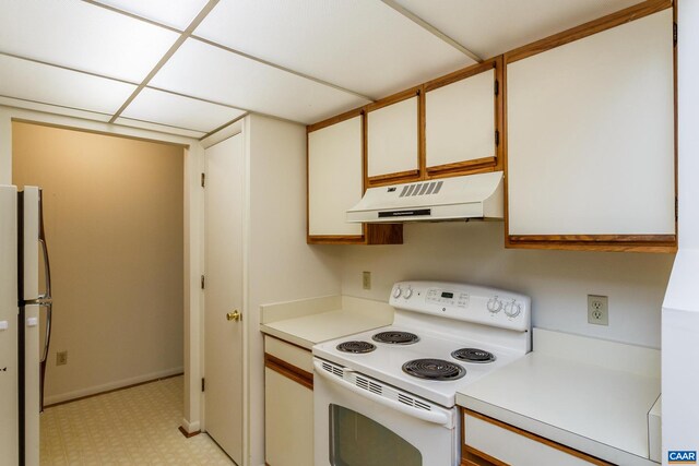 115 Turtle Creek Rd Unit 11, Charlottesville, VA 22901 - kitchen featuring white range with electric stovetop, under cabinet range hood, freestanding refrigerator, light countertops, and light floors