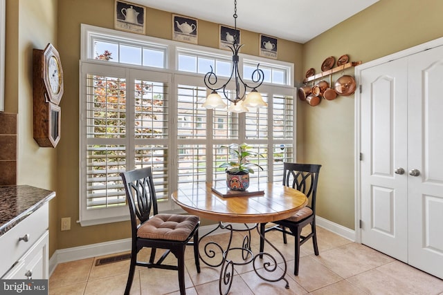 6 Easton Ln, Cinnaminson, NJ 08077 - dining room with a chandelier, baseboards, and light tile patterned floors