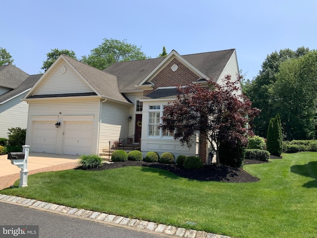 6 Easton Ln, Cinnaminson, NJ 08077 - view of front of house featuring an attached garage, a front lawn, and concrete driveway