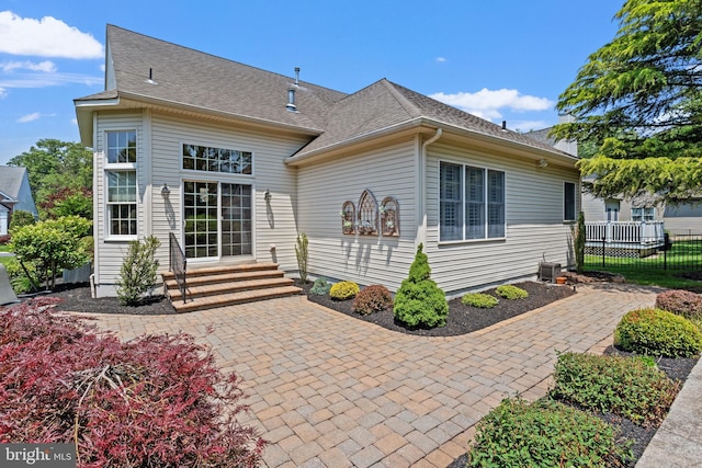 6 Easton Ln, Cinnaminson, NJ 08077 - rear view of property with entry steps, a patio, and roof with shingles