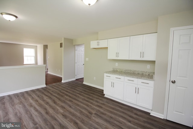 7 E Edgewater Ct, Sicklerville, NJ 08081 - kitchen featuring dark wood-style flooring, white cabinets, light stone countertops, and baseboards