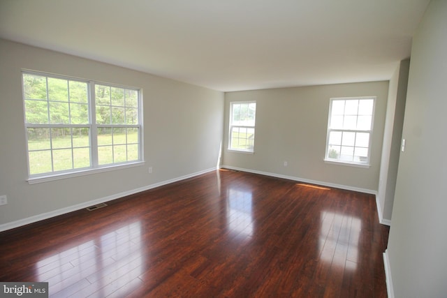 7 E Edgewater Ct, Sicklerville, NJ 08081 - spare room featuring dark wood-type flooring and baseboards